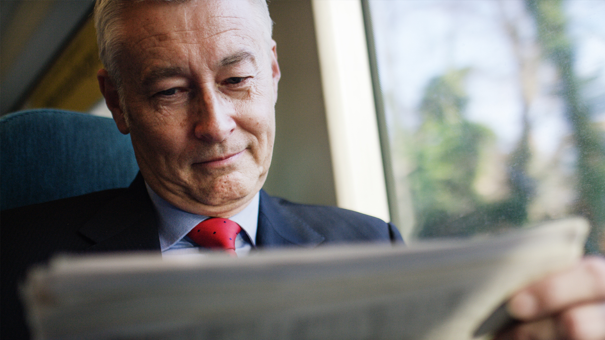 Man reading newspaper